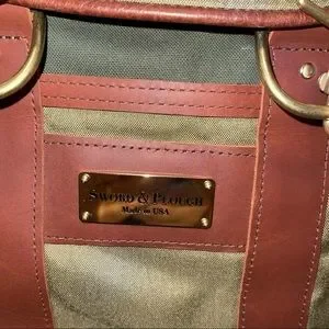 Sword & Plough Upcycles Military leather Canvas Fabric Back Pack Sword & Plough upcycles military fabric into sleek bags | Grist main image 4